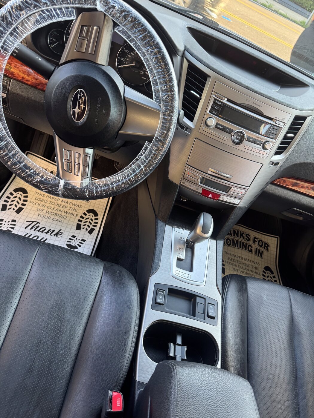 Immaculate dashboard, console, and cup holders after detailing